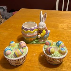 Easter bunny with egg and two candle holders
